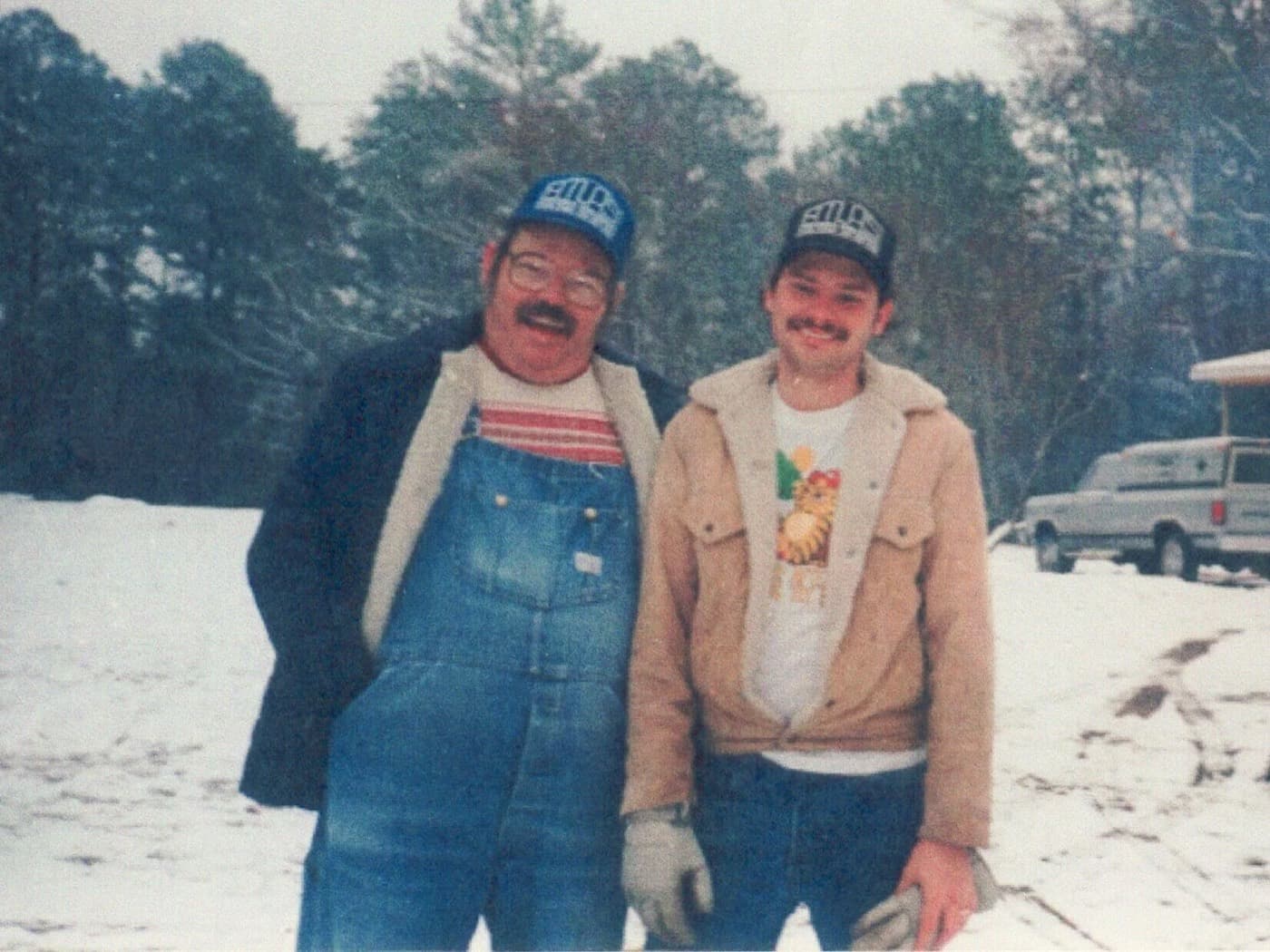 William F. Downs, Jr. with his father on the original Tyler lot in the snow
